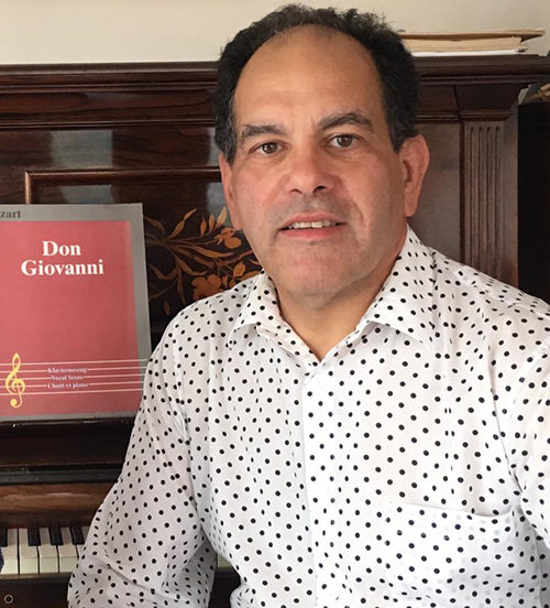 Simon Romanos pausing during rehearsal for the opera Don Giovanni.